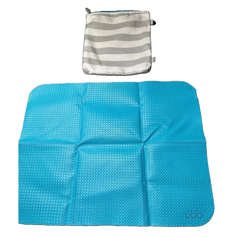 Ubbi On-The-Go Baby Diaper Changing Mat, Portable Foldable Travel Pad